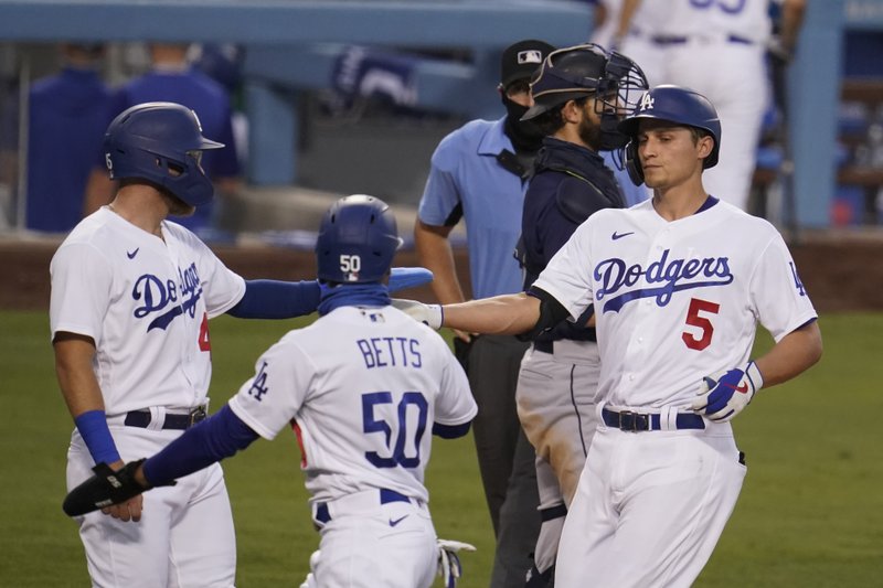 Hermanos Seager jonronean, Dodgers remontan ante Marineros